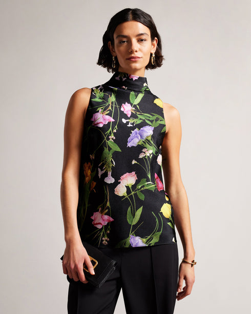 DEMITRI-Tops-The ultimate wardrobe staple, DEMITRI has it all. The scattered bouquet print and oversized self-tie fastening are the perfect combination for a stylish look that will elevate whatever jeans, skirt or trousers you pair with it. The fabric of this product is made with 100% recycled polyester. Using recycled polyester helps divert plastic waste from ending in landfills, and helps us to reduce our dependence on virgin materials. Sleeveless top Scattered bouquet print Cowl neck Oversized self-tie f